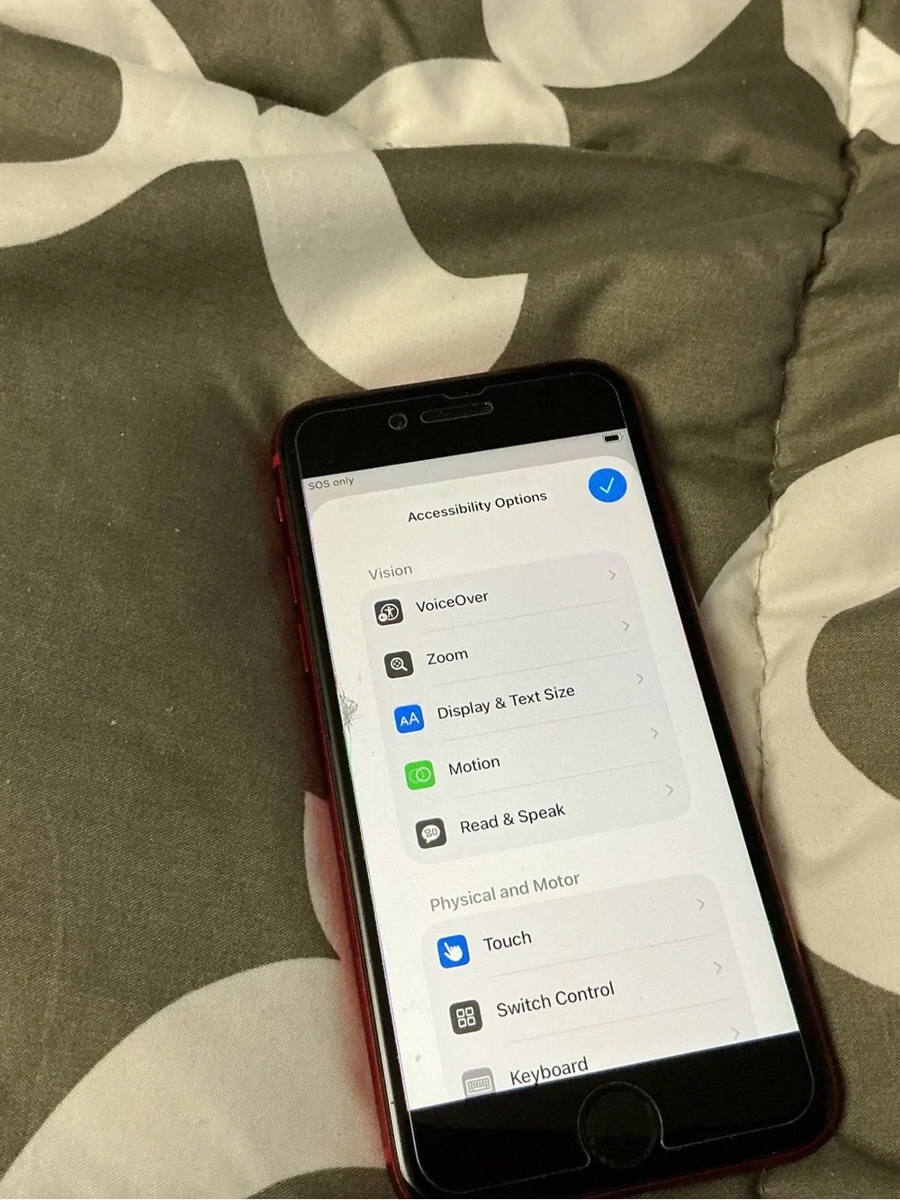 Apple iPhone with Red Case and Black Front